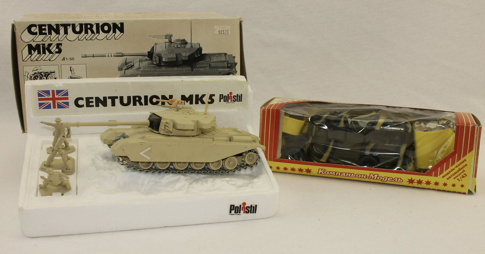 Polistil of Italy Tanks with Crew: Lot includes a Centurian MK-5 Tank with Crew in 1:50 Scale (Boxed)and a Russian Made Military Transport in 1:43 Scale, (Boxed). 5 Pieces. Condition Excellent. Boxes Good with Inserts.
