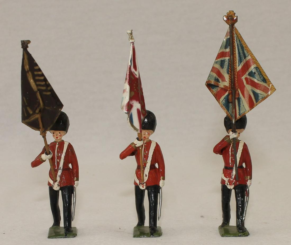 Britains From #2084 Scots Guard Color Party: Includes 2 Lead Flags and 1 Tin Flag. 6 Pieces. Condition Good to Very Good. No Box.