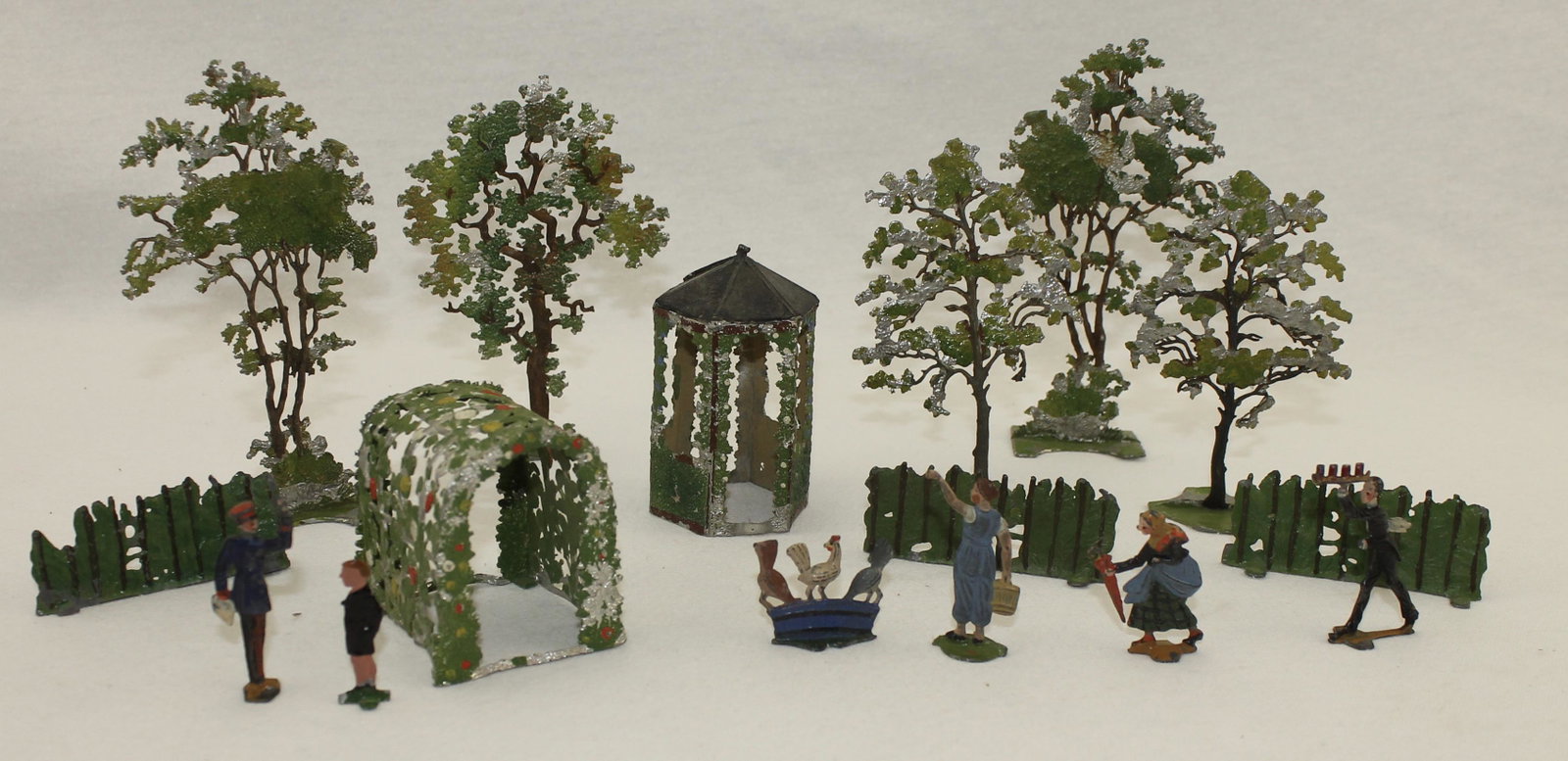 German Garden Pieces with Demi-Round Figures: 40mm Figures. 16 Pieces. Condition Good to Very Good. Paint Loss to Trees, Gazebo and Arch. No Box.