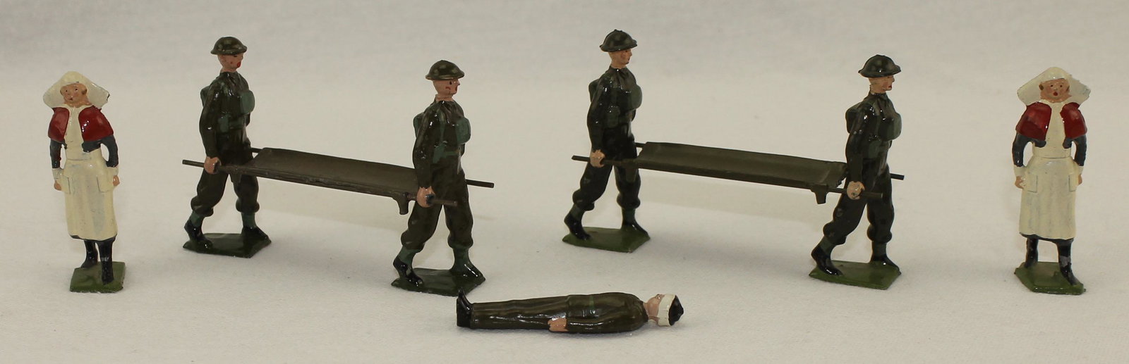 Britains #1723 Royal Army Medical Corps: Post War. Includes Orderlies, Nurses and Wounded. 9 Pieces. Condition Excellent. No Box.