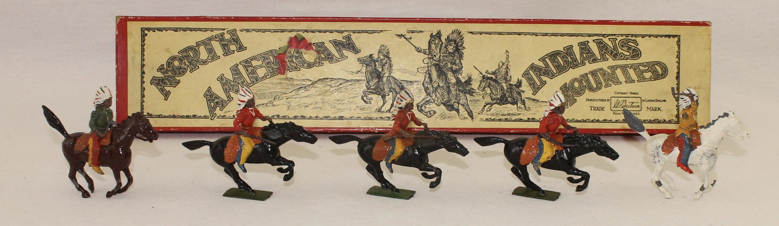 Britains #152 North American Indians Mounted: Post War. 5 Pieces. Condition Very Good to Excellent. 2 Rifle Butts Missing. Box Very Good.