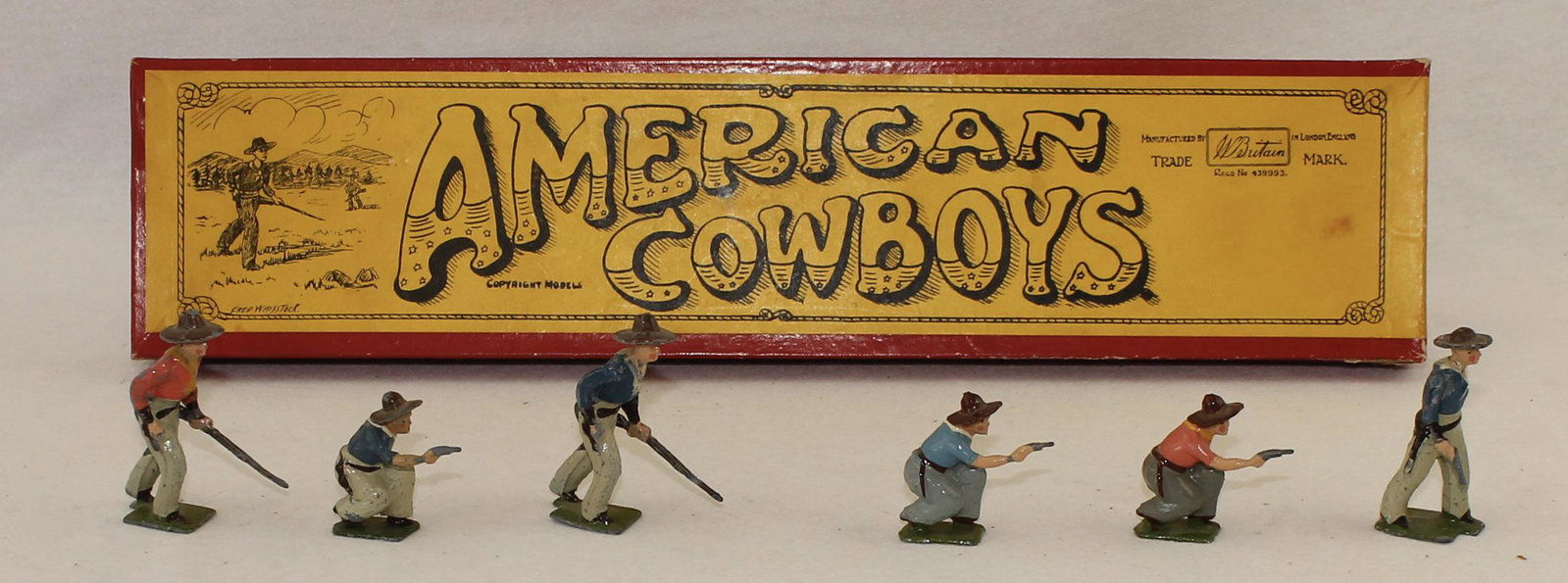 Britains From #183 American Cowboys on Foot: Post War. Mismatched. 6 Pieces. Condition Very Good. Box Very Good. Incorrect Tie Card.