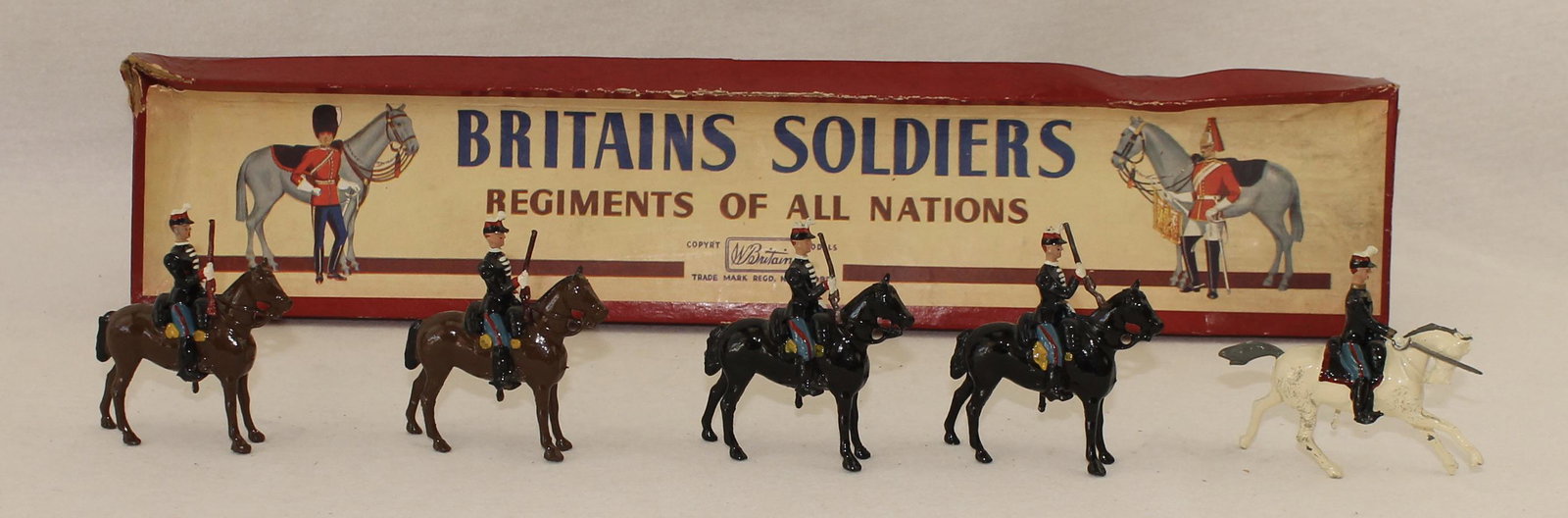 Britains #190 French Chasseurs A Cheval: Post War. In ROAN Box. 5 Pieces. Condition Excellent. Box Fair to Good. Box Lid Crushed.