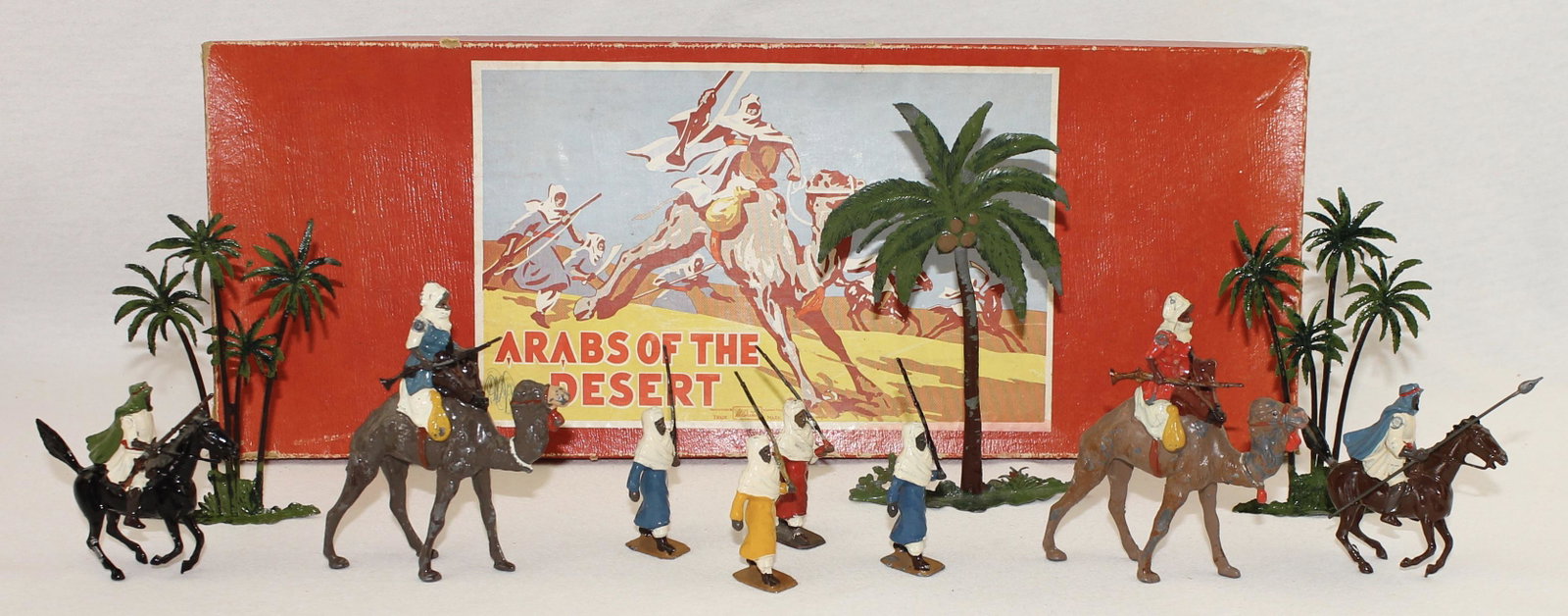Britains #224 Arabs of the Desert: Post War. Mismatched Paint. 11 Pieces. Condition Good to Very Good. Paint Wear to Camels. Box Fair to Good. Lacking End Label. Split Sides to Lid.