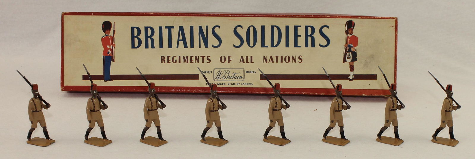 Britains #225 King's African Rifles: Post War. In ROAN Box. 8 Pieces. Condition Excellent. Box Fair with Edge Wear and Tears. Box Bottom Incorrect with Pre War Tie Card.