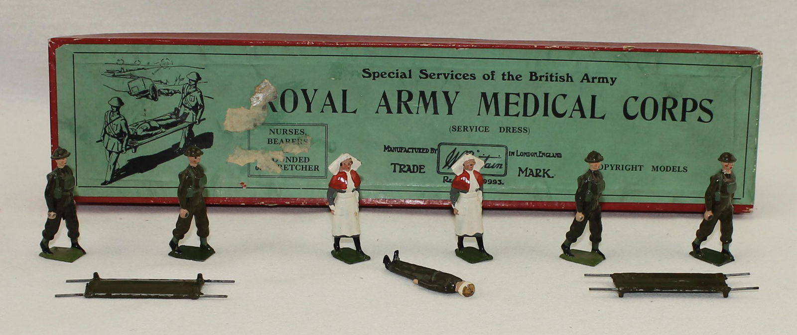 Britains #1723 Royal Army Medical Corps: Pre War. 9 Pieces. Condition Excellent. Box Good. Old Sticky Tape on Label.