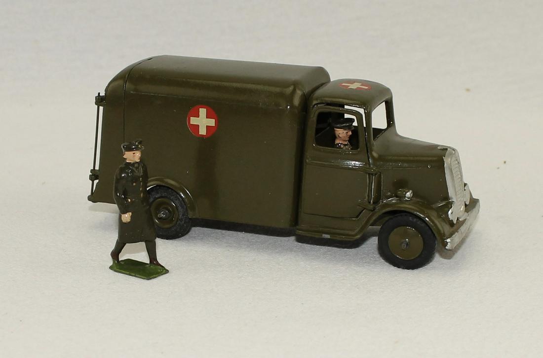 Britains From #1512 Army Ambulance: Post War. With Driver. Also includes Nurse From #1897. Lacks Stretcher and Wounded. 3 Pieces. Condition Excellent. No Box.