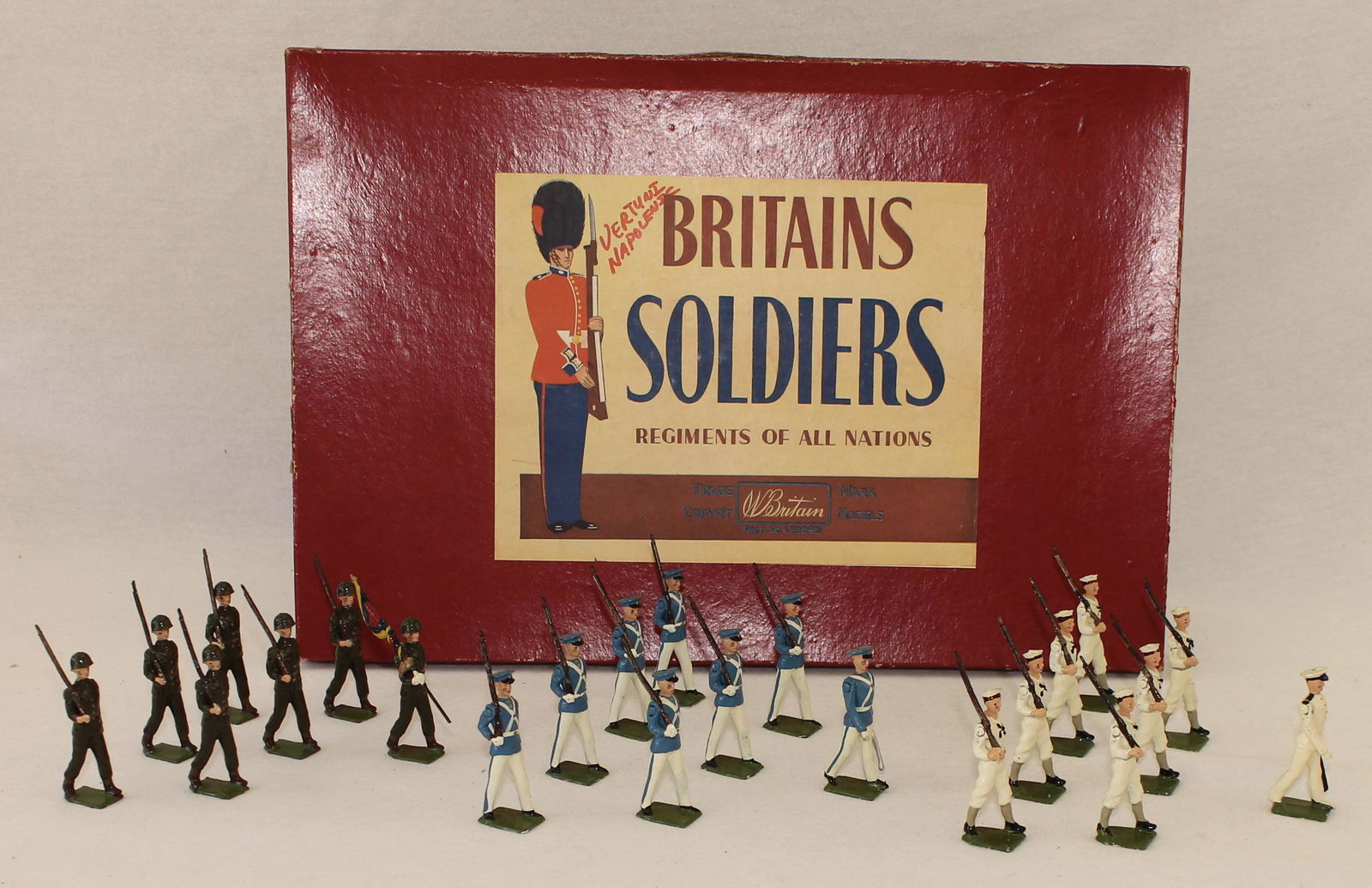 Britains #2100 Venezuelan Military Cadet Display: Post War. In ROAN Box. Venezuelan Military School Cadets Display. 23 Pieces. Condition Excellent. Box Very Good. Edge Wear. Ink Writing on Label.