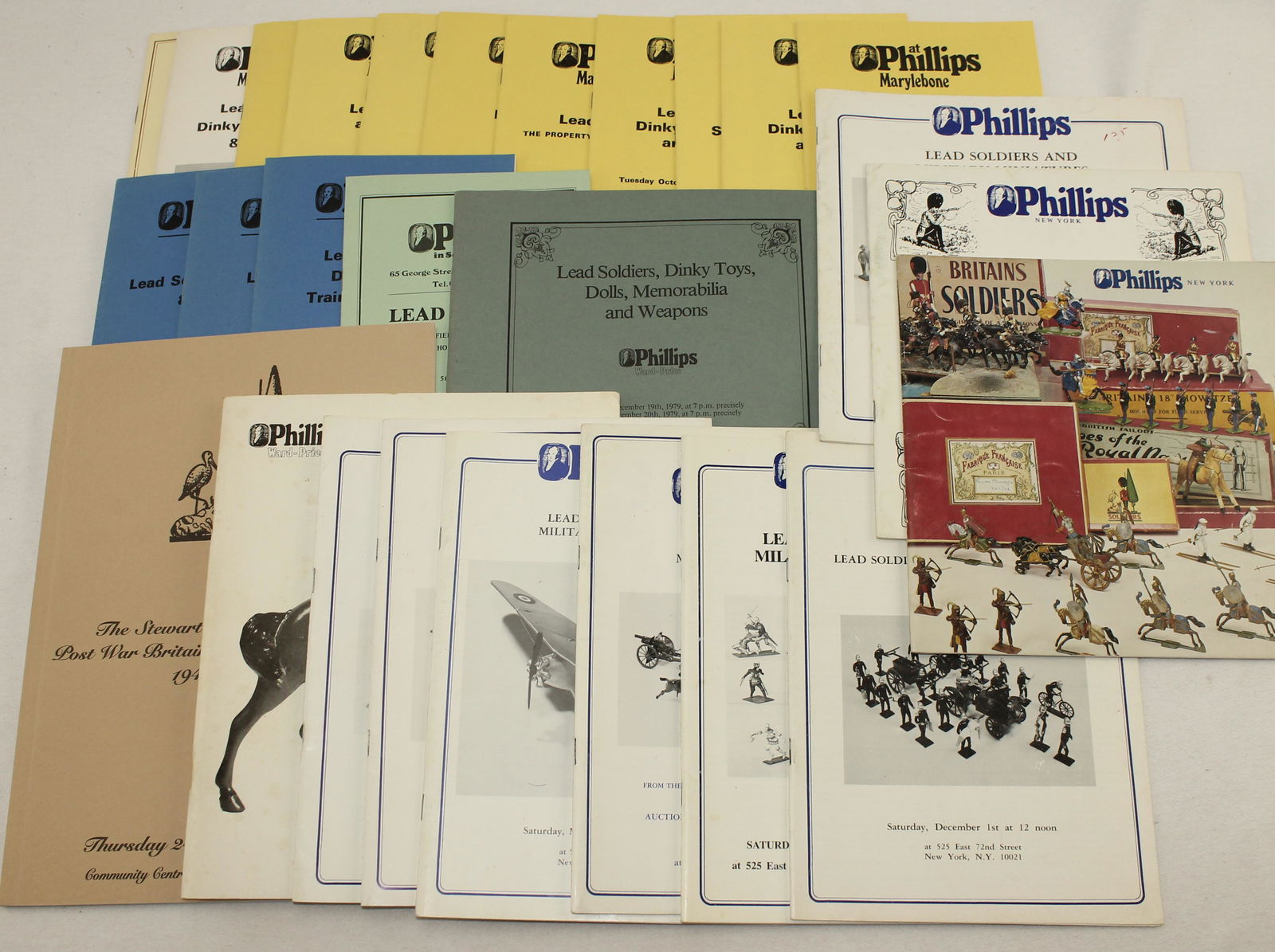 Lot of Phillips Auction Catalogs: Lot includes Toy Soldier Auction Catalogs From the Phillips Auction House Dating From the 1970's and 1980's. 27 Pieces. Condition Very Good. No Box.