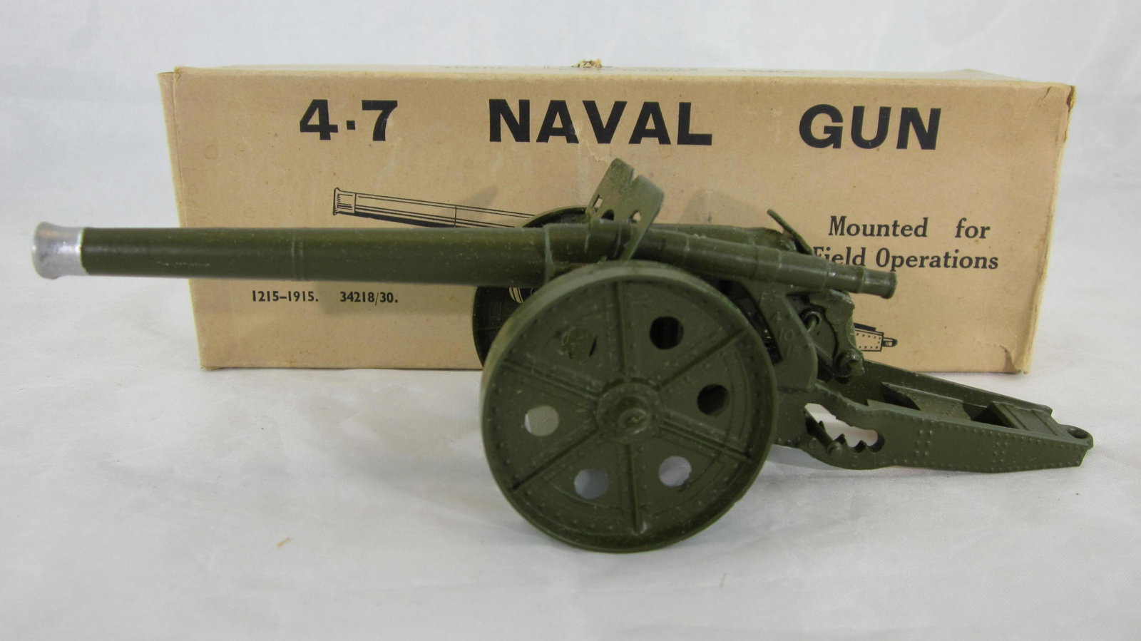 Britains Set #1264 4.7" Naval Gun.: Boxed Naval Gun circa 1950s. 1 piece, condition excellent in very good thin cardboard illustrated box, 1 end flap off but present.