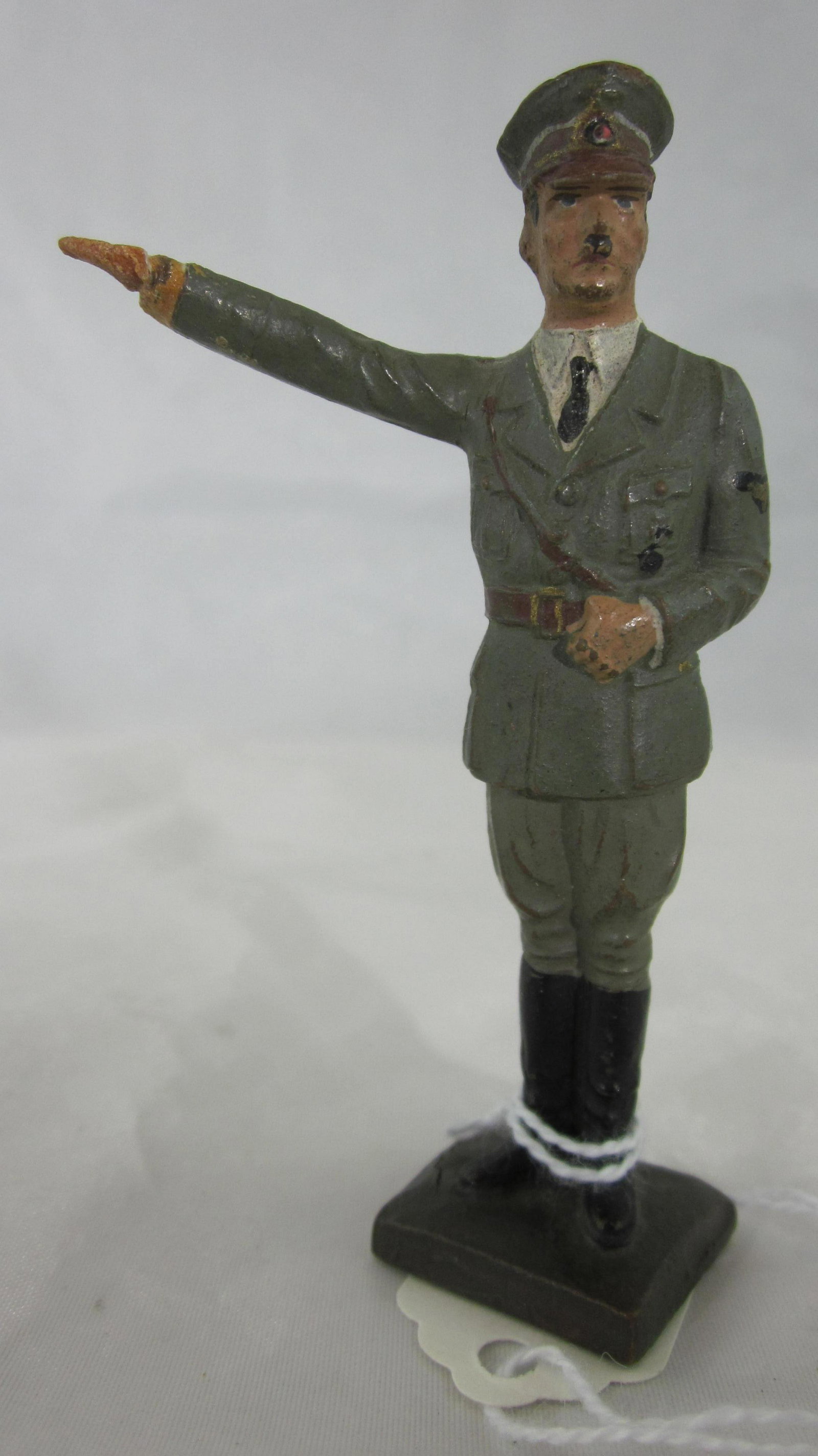 Lineol Adolf Hitler Saluting With Fixed Arm.: UNBOXED 7cm Adolf Hitler raised arm saluting, fixed arm figure circa 1930s. 1 piece, condition excellent, paint is excellent. See page 108 of Dennis Fontana's Lineol Book. No box.