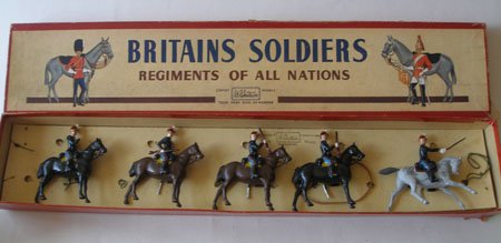 Britains Set #190 Regiment Chasseurs A Cheval Belgian: Britains Set #190 Regiment Chasseurs A Cheval Belgian Cavalry (One Carbine broken) with Offi cer in Original R.O.A.N Box –Untied. 5 Pieces. Condition Excellent, Box Very Good.
