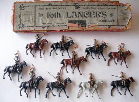 Britains B Series From Set # 12b and 13b. Pre 1916.: Britains B Series From Set # 12b and 13b. Pre 1916. 16th &17th Lancers with Original Box for Set #12b (Poor Condition). Seven 16th Lancers on walking Horses including Trumpeter (All Lance Tips Missing