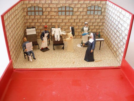Mignot Military Hospital Scene. Post War: Mignot Military Hospital Scene. Post War, Consisting of Hospital beds, seated and lying wounded Surgeon Nurse and two Nuns. 11 pieces with original box (No box top).