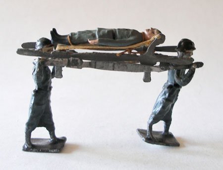 L.P VERY UNUSUAL French Hollow Cast. Poilu Stretcher : L.P VERY UNUSUAL French Hollow Cast. Poilu Stretcher Party with wounded, Stretcher being carried at shoulder height contains original cloth blanket. Circa 1930.