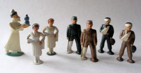 Barclay Dimestore Pod Foot Nurses and Wounded, ETC.: Barclay Dimestore Pod Foot Nurses and Wounded with a Prototype Nurse by Manoil with Ether bottle, reproduced by Eccles Brothers Ltd. 7 Pieces.