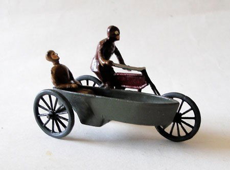 Heyde VERY RARE Motorcycle and Sidecar combination: Heyde VERY RARE Motorcycle and Sidecar combination from Aerodrome display set, containing seated passenger, 1910. Unboxed.