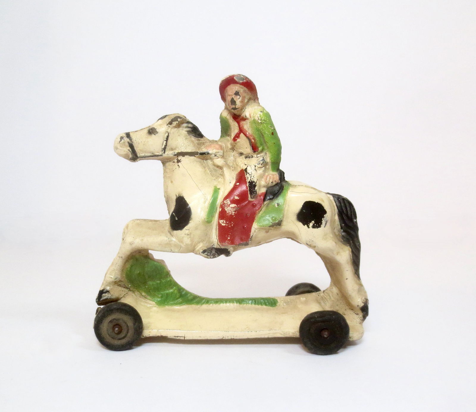 Auburn Rubber #A48 Cowboy on Wheeled Horse (1 of 1)
