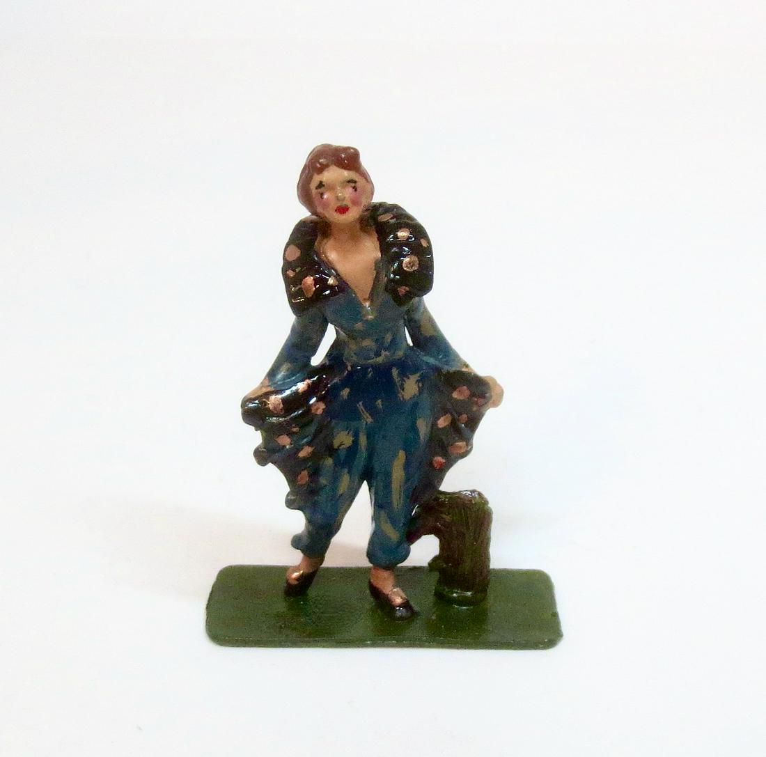 Large Scale 75mm Dancing Girl: Dancing figure in lovely metallic coloured dress which has the feeling of a lively dance. 75mm tall. Unidentified maker.