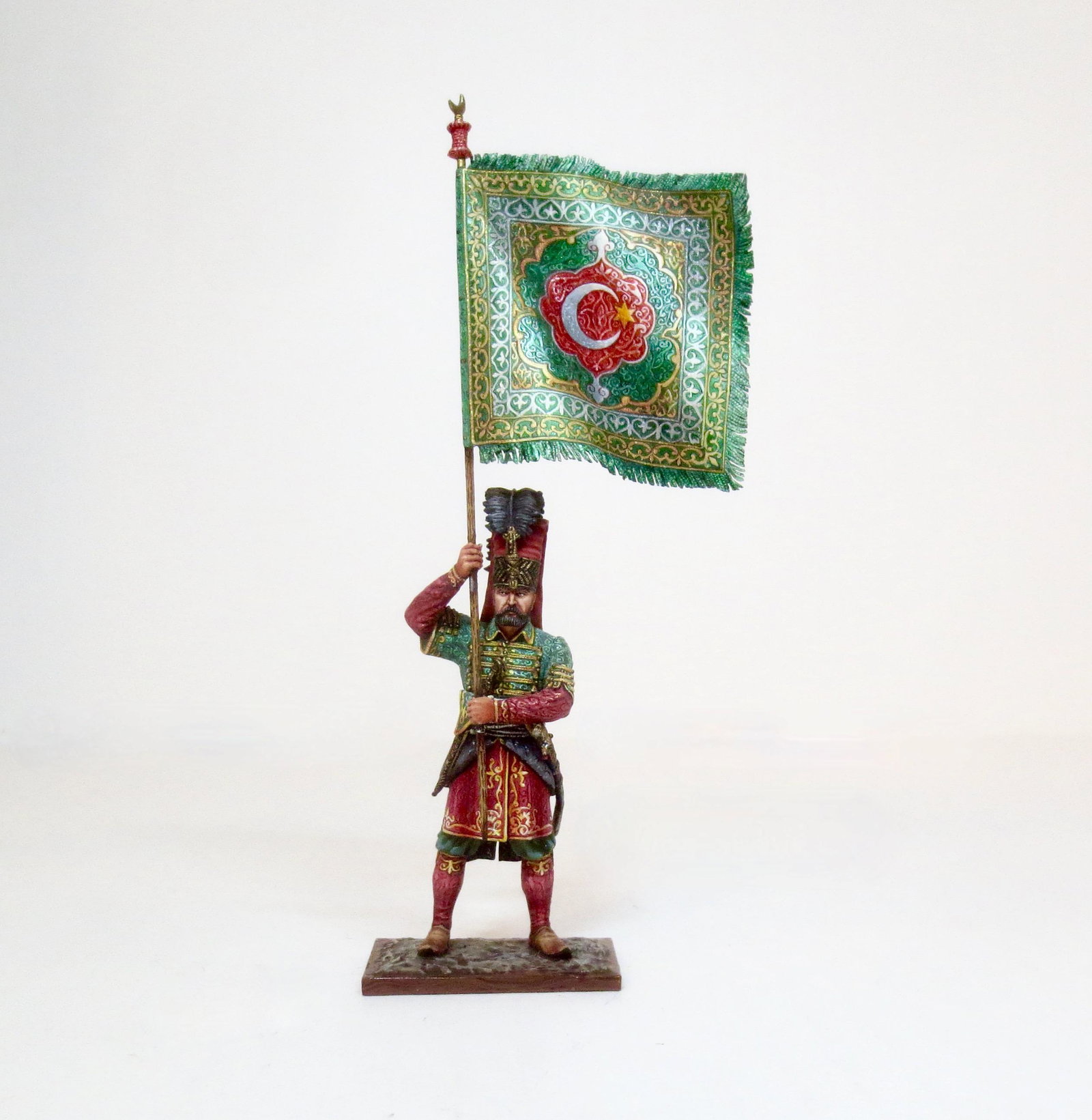 St. Petersburg Turkish Janissary Holding Flag: Studio painted. 70mm tall to the top of his helm. Mint condition. No box.