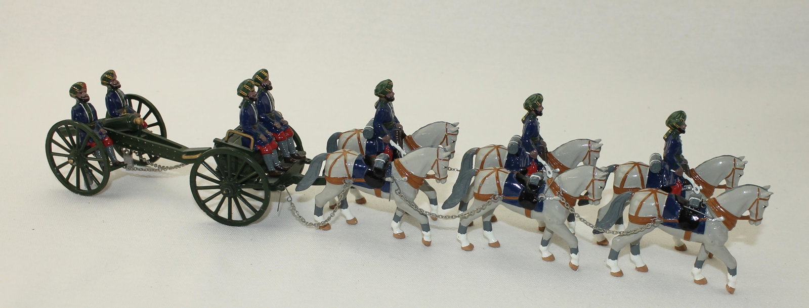 Trophy of Wales Hyderabad Horse Drawn Gun Team: Raj and the Indian Army Series. Hyderabad Horse Drawn Gun Team. 15 Pieces. Condition Very Good. Lacks 2 Chains. One Chain Loop Broken on Horse. No Box.