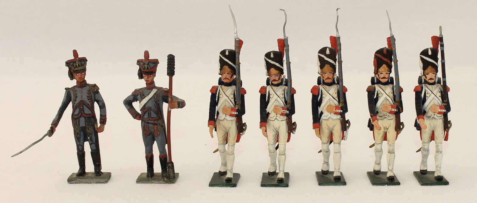 Rose Napoleonic Officer and Gunners: Napoleonic Officer and Gunners. 7 Pieces. Condition Very Good to Good. One Bayonet Missing. Officer's Sword Damaged. No Box.
