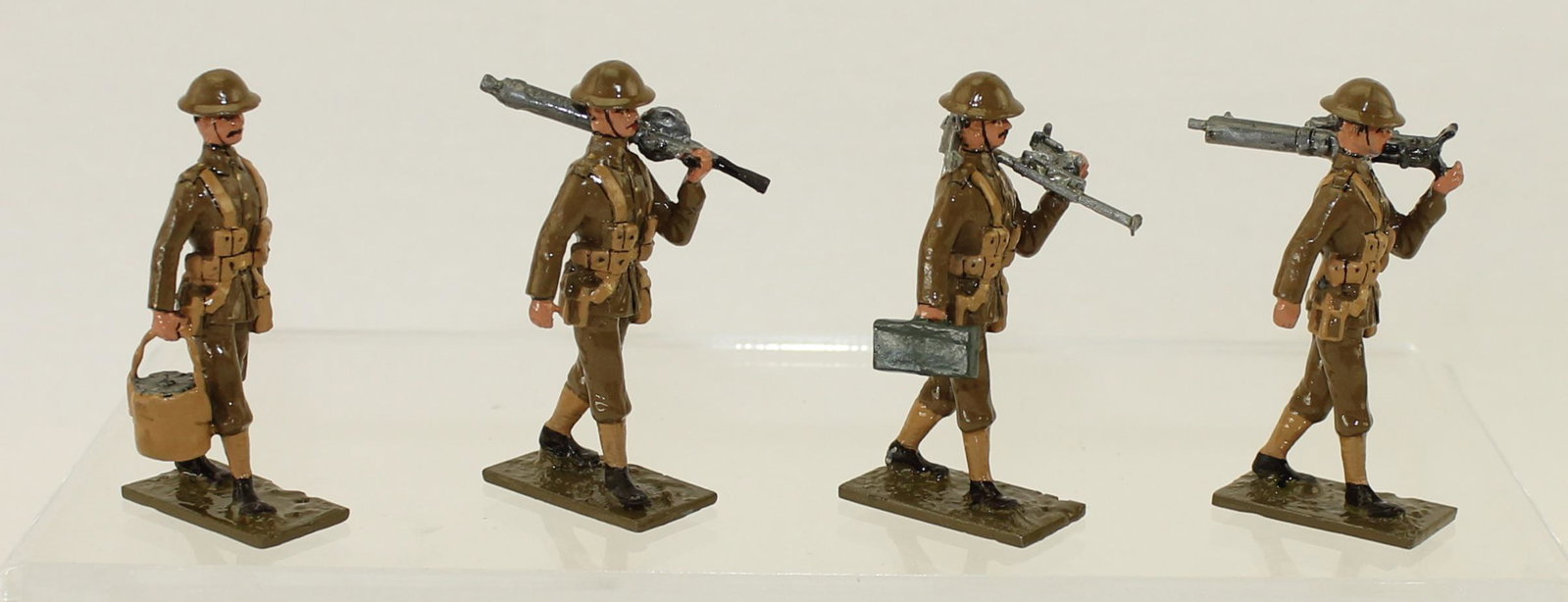 Tommy Atkins Lot Machine Gun Crew Walking: World War I. British Machine Gun Crew Walking. 4 Pieces. Condition Excellent. No Box.