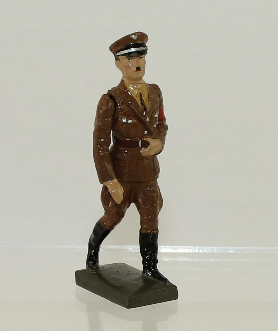 Lineol Hitler Walking in Party Uniform: Lineol Germany. # 5/2. Movable Arm. Circa 1937. Composition 7.5cm. 1 Piece. Condition Excellent. No Box.