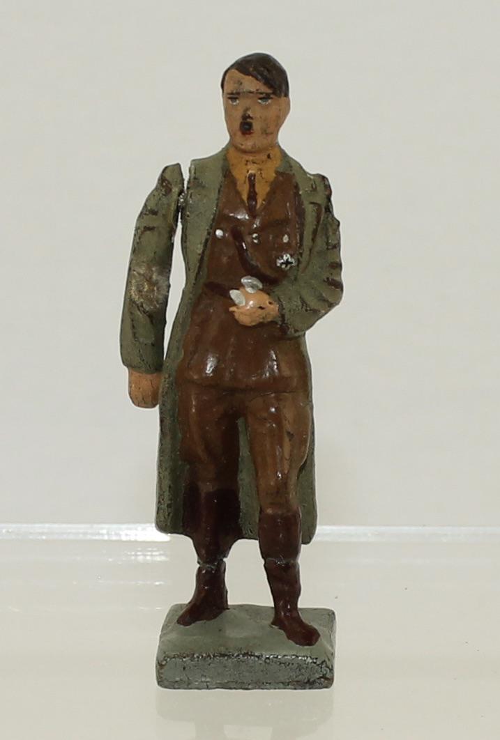 Lineol Hitler in Open Overcoat: Lineol Germany. # 9/4. With Movable Arm. Circa 1936. Composition 7.5cm. 1 Piece. Condition Good. No Box.