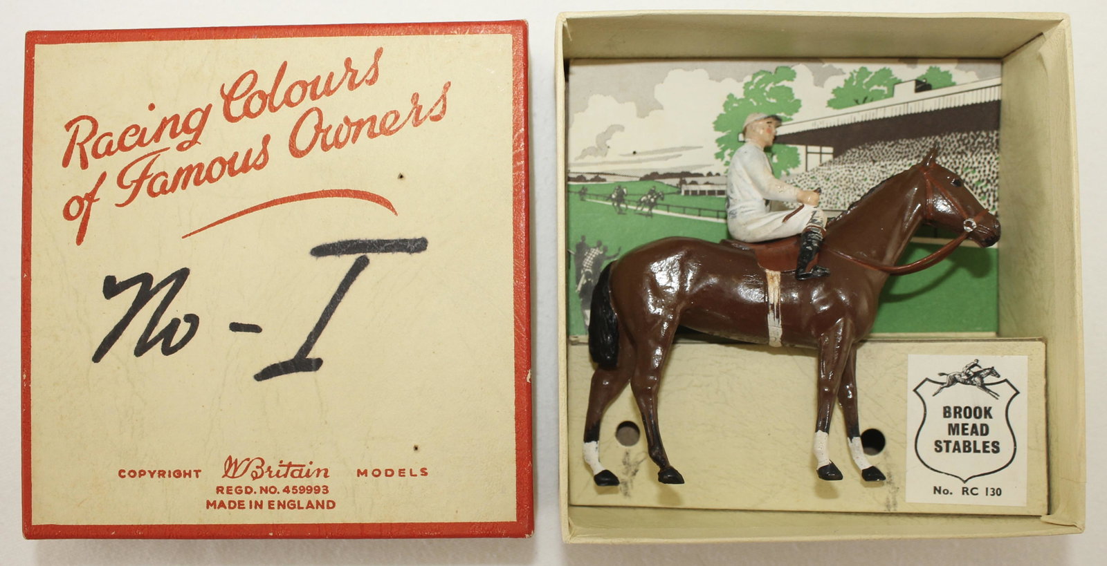 Britains American Racing Colors: Set RC-130. Brook Mead Stables. Rider's Crop Broken. 2 Pieces. Condition Good. Paint wear to Jersey. Box Very Good. Ink Writing on Box Top.