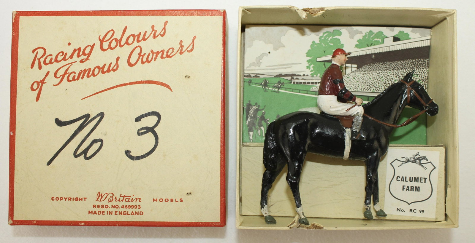Britains American Racing Colors: Set RC-99. Calumet Farm. Post War. Rider's Crop Bent. 2 Pieces. Condition Good to Very Good. Paint Distressed on Sides of Jockey's Boots. Box Good to Very Good. Ink Writing on Label.