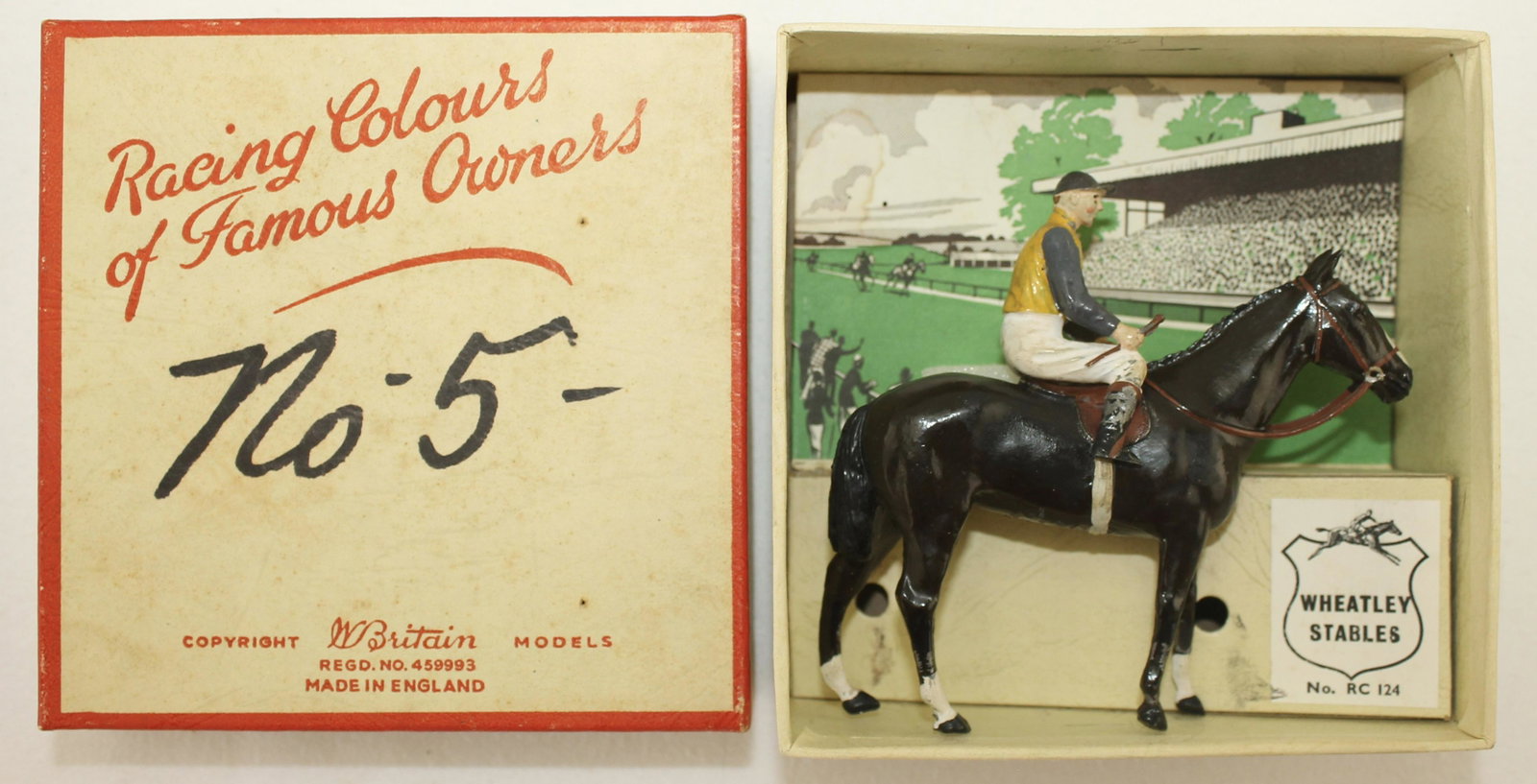 Britains American Racing Colors: Set RC-124. Wheatley Stables. Post War. 1958-60 only. Rider's Crop Intact. 2 Pieces. Condition Very Good. Paint Distressed on Rider's Boots. Box Very Good. Ink Writing on Box Top.