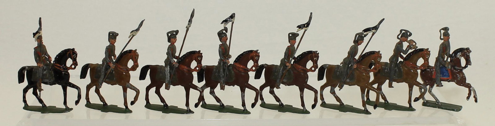 Spenkuch Lot German Lancers: Spenkuch Germany. Lot includes Officer, Bugler and Troops. 45mm. Officer on Incorrect Horse. 8 Pieces. Condition Very Good. One Lance Tip Broken. No Box.