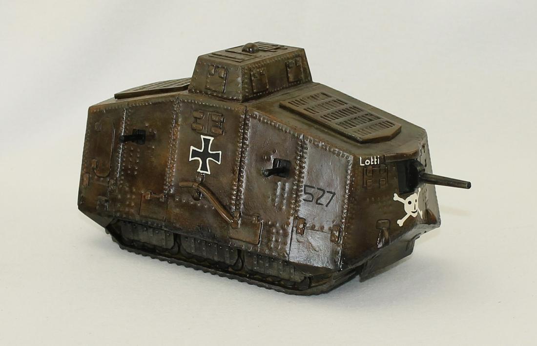 Large Die Cast German Tank: World War I. With "527" on Side Panel and "Lotte" on Front. Measures 9-1/2 " Long. 1 Piece. Heavy. Condition Very Good. Gun Loose. No Box.
