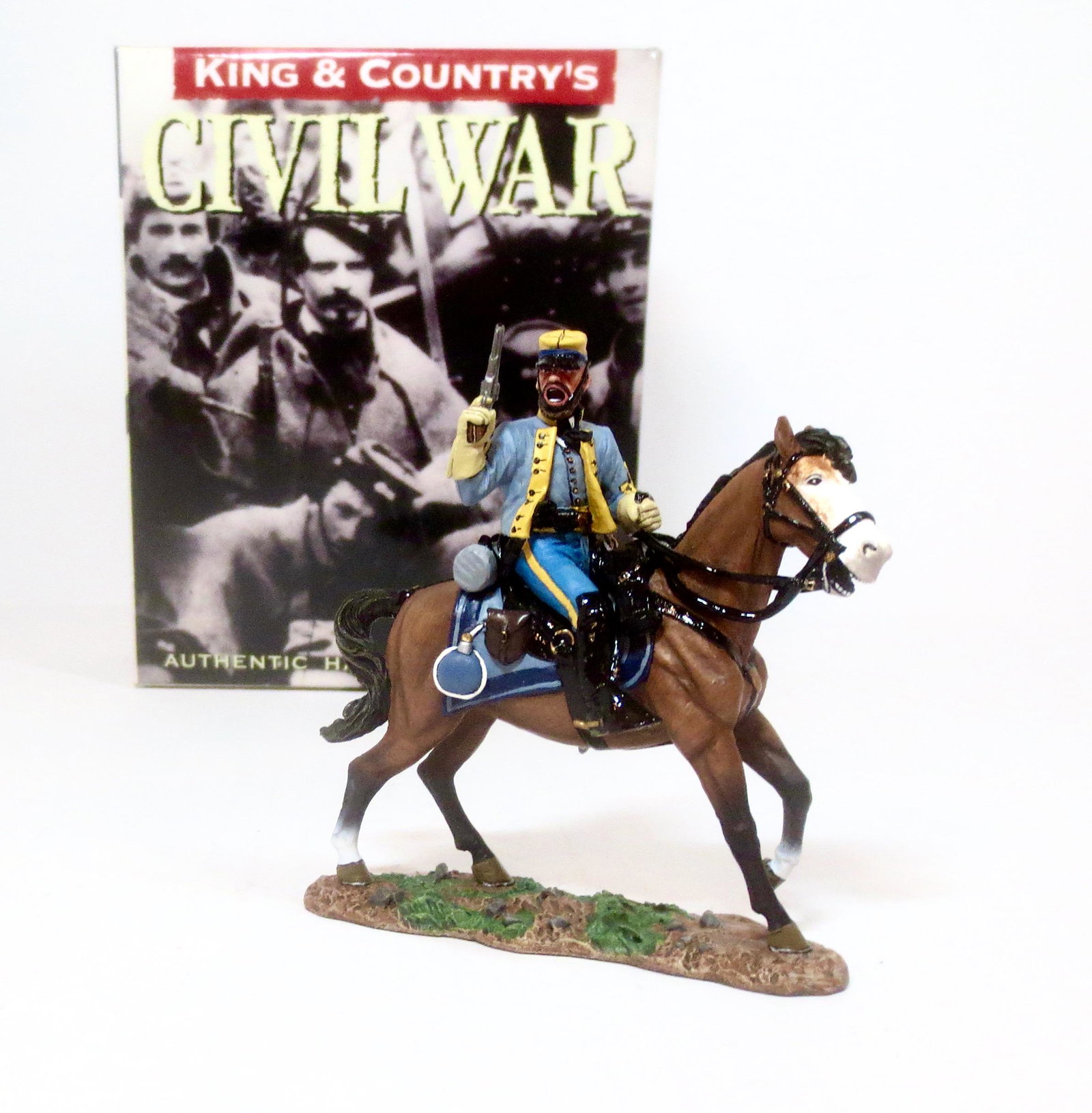 King & Country #CW040 Mounted Confederate: Officer with pistol. Retired figure. 1 piece. Mint condition. Box excellent.