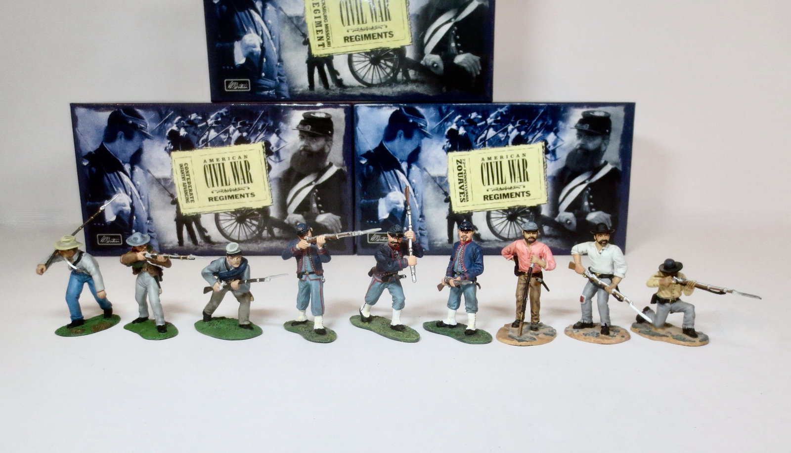 Britains American Civil War Series: Confederate Infantry Advancing #17014, 72nd Pennsylvania Zouaves #17241, and Vicksburg Missouri Regiment #17378. 9 pieces. Mint condition. Boxes excellent.
