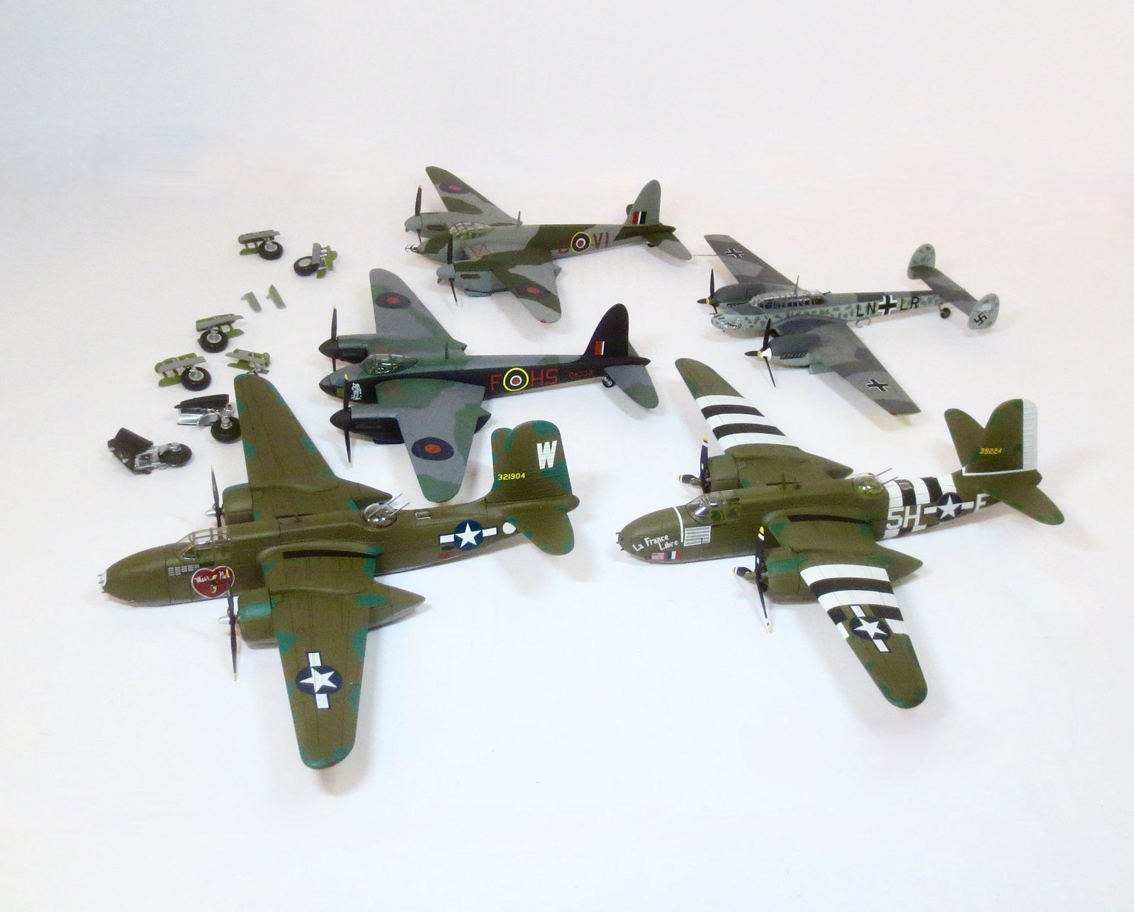 Corgi Military Airplanes: Diecast. 1:72 scale. 6.5" to 7.5" long. 5 pieces. Good overall condition (some loose pieces, possibly some missing parts). Unboxed.
