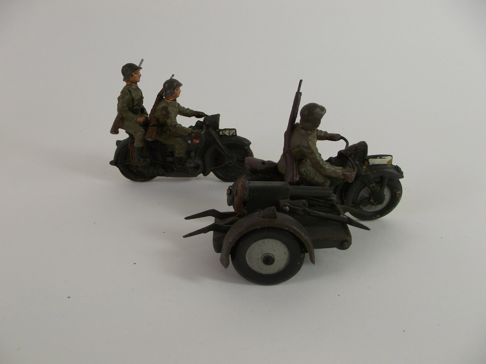Elastolin German Motorcycle Corps Machine Gun: 5 pieces in good condition. 70 mm composition and metal. Missing one crew man.