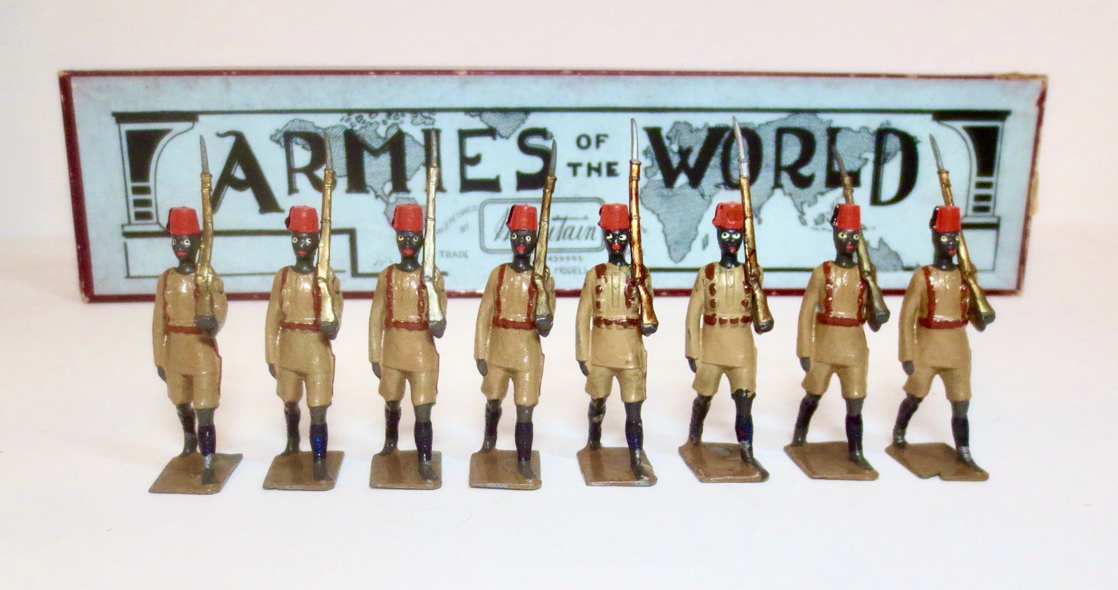 Britains #225 The King's African Rifles: Pre war issue. 8 pieces. Near mint condition. "Armies of The World" label box in good condition (missing tie card insert).