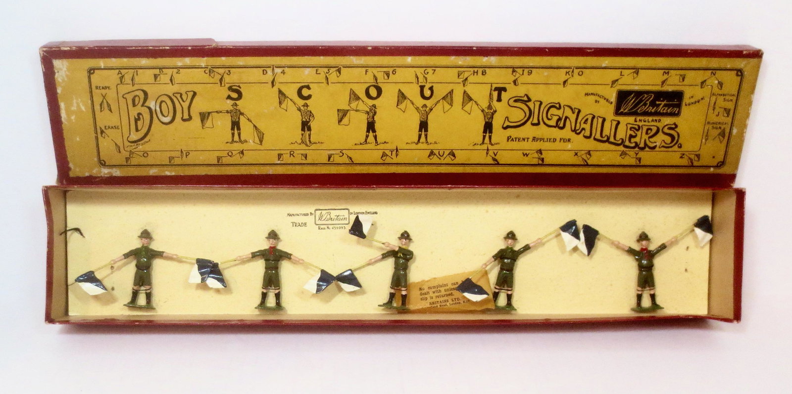 Britains #163 Boy Scout Signalers: Pre war issue. 5 pieces. Mint to near mint condition, tied to card in Whisstock illustrated label box. Box in very good condition, with one top side split, and a few nicely done repairs.
