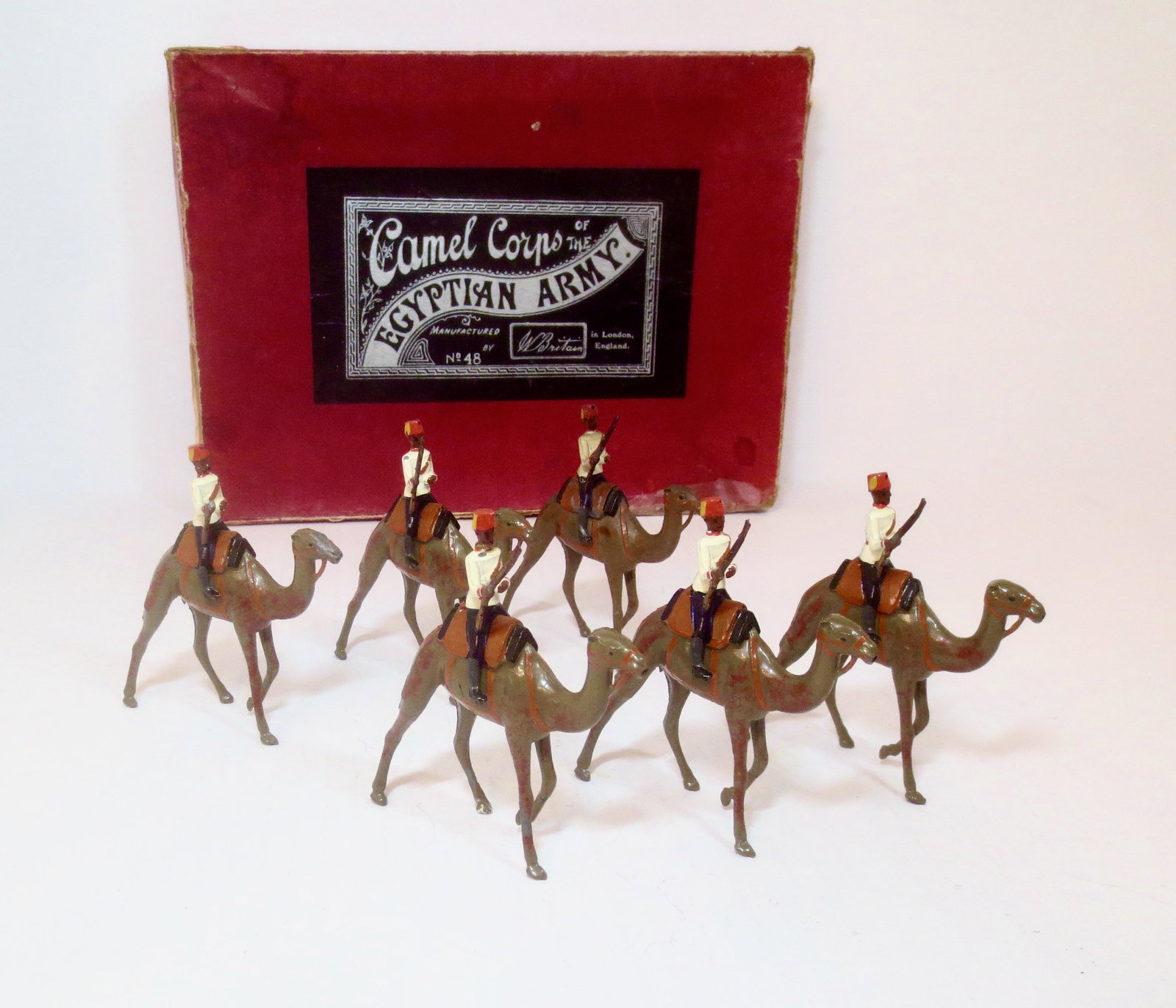 Britains #48 Egyptian Army Camel Corps: Pre war issue. 6 pieces. One mismatched paint, and one missing rifle tip, the rest in near mint condition. Black and silver label box in poor condition.