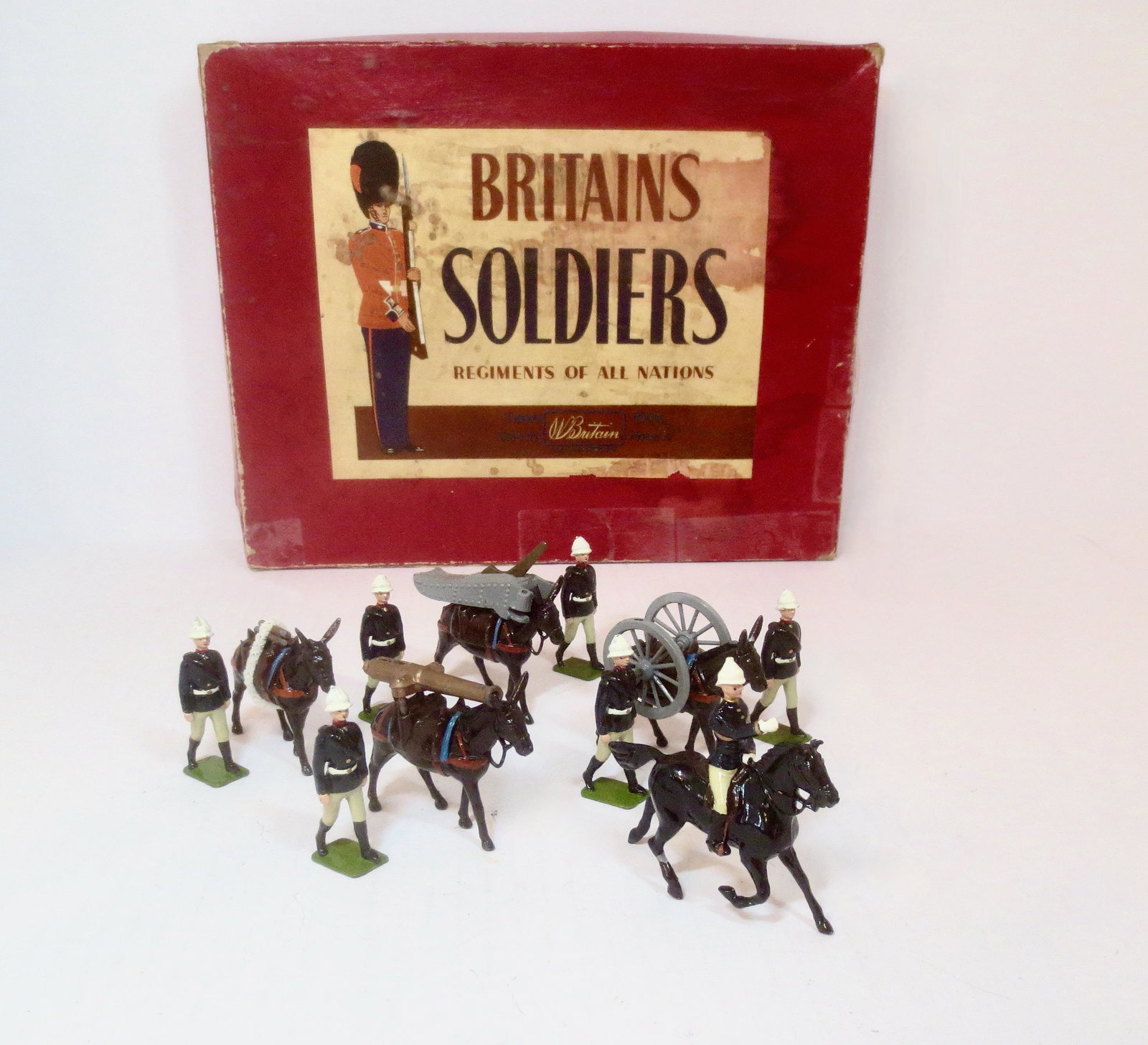 Britains #28 Royal Artillery Mountain Gun: Post war issue. 14 pieces. Near mint to excellent condition. ROAN box poor.
