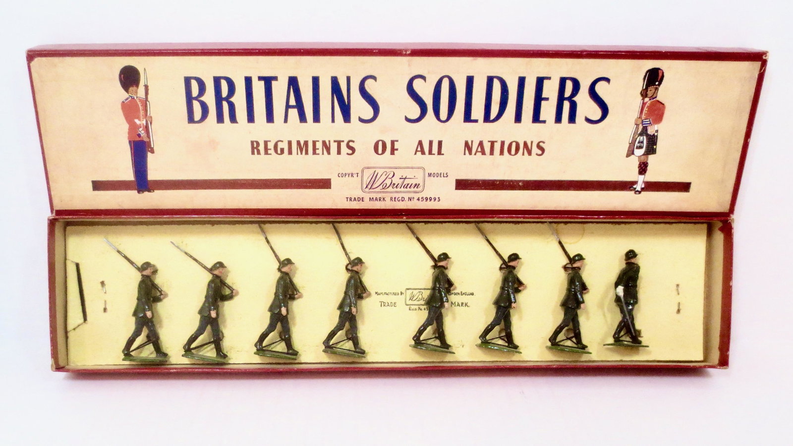 Britains #432 German Infantry: Post war issue. Mint to near mint condition, tied to card in ROAN label box. Box excellent. 8 pieces.