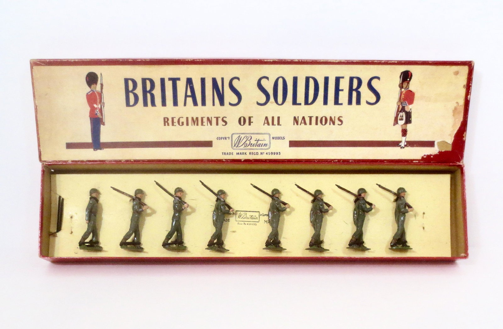 Britains #2033 United States Army Infantry: Post war issue. 8 pieces. Mint condition, tied to card in the box. Box good, some top label damage.