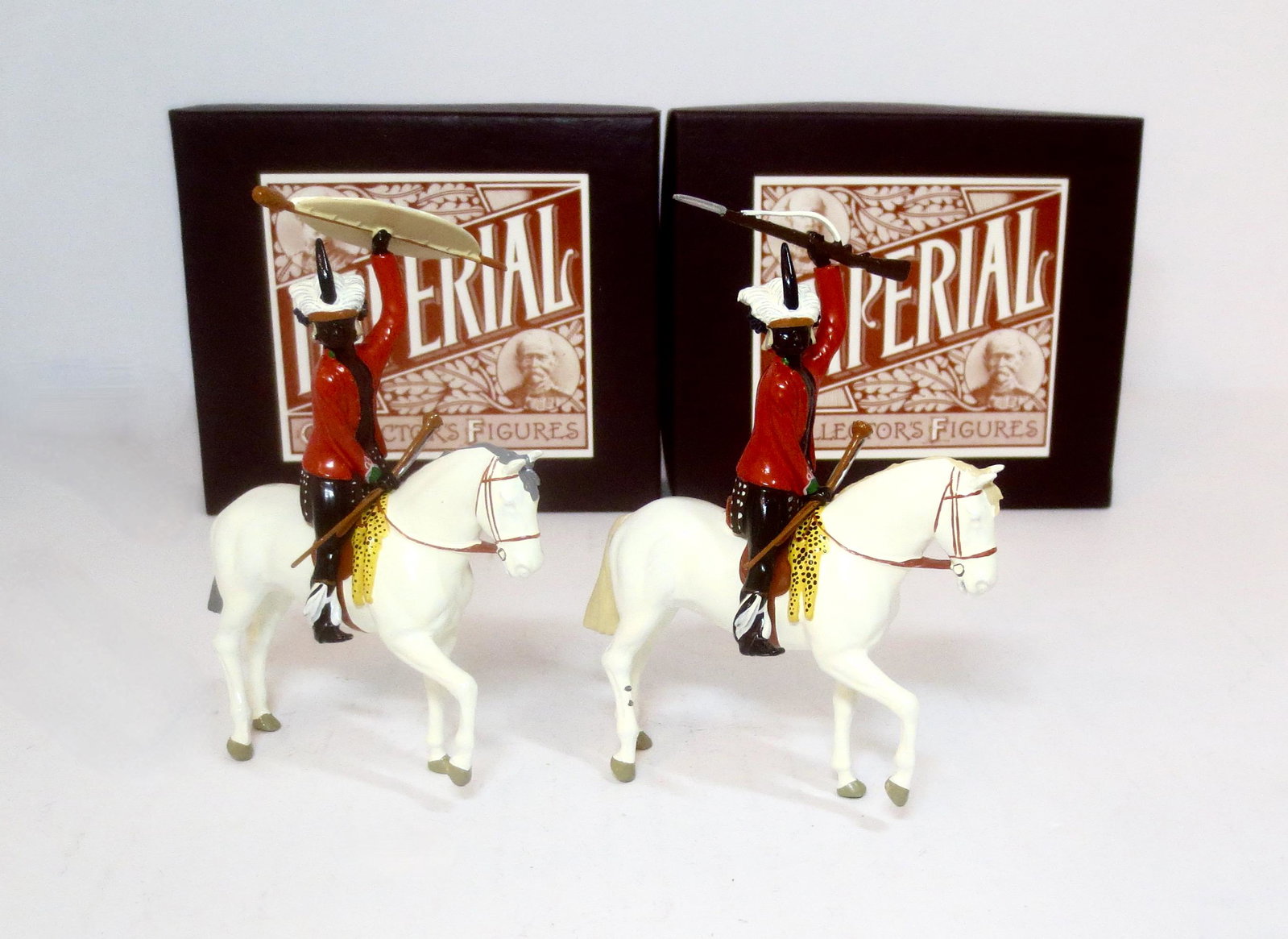 Imperial Mounted Zulus: Zulu Chief with Shield #38a, and Mounted Zulu Chief with Rifle #38b. 2 pieces. Mint to near mint condition. Boxes excellent.