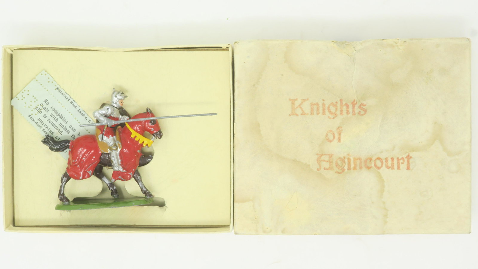 Britains Set #1661 Mounted Knight of Agincourt: with lance (red) in original plain buff box (1959) Good, with original complaints slip; box lid water stained, 1 piece