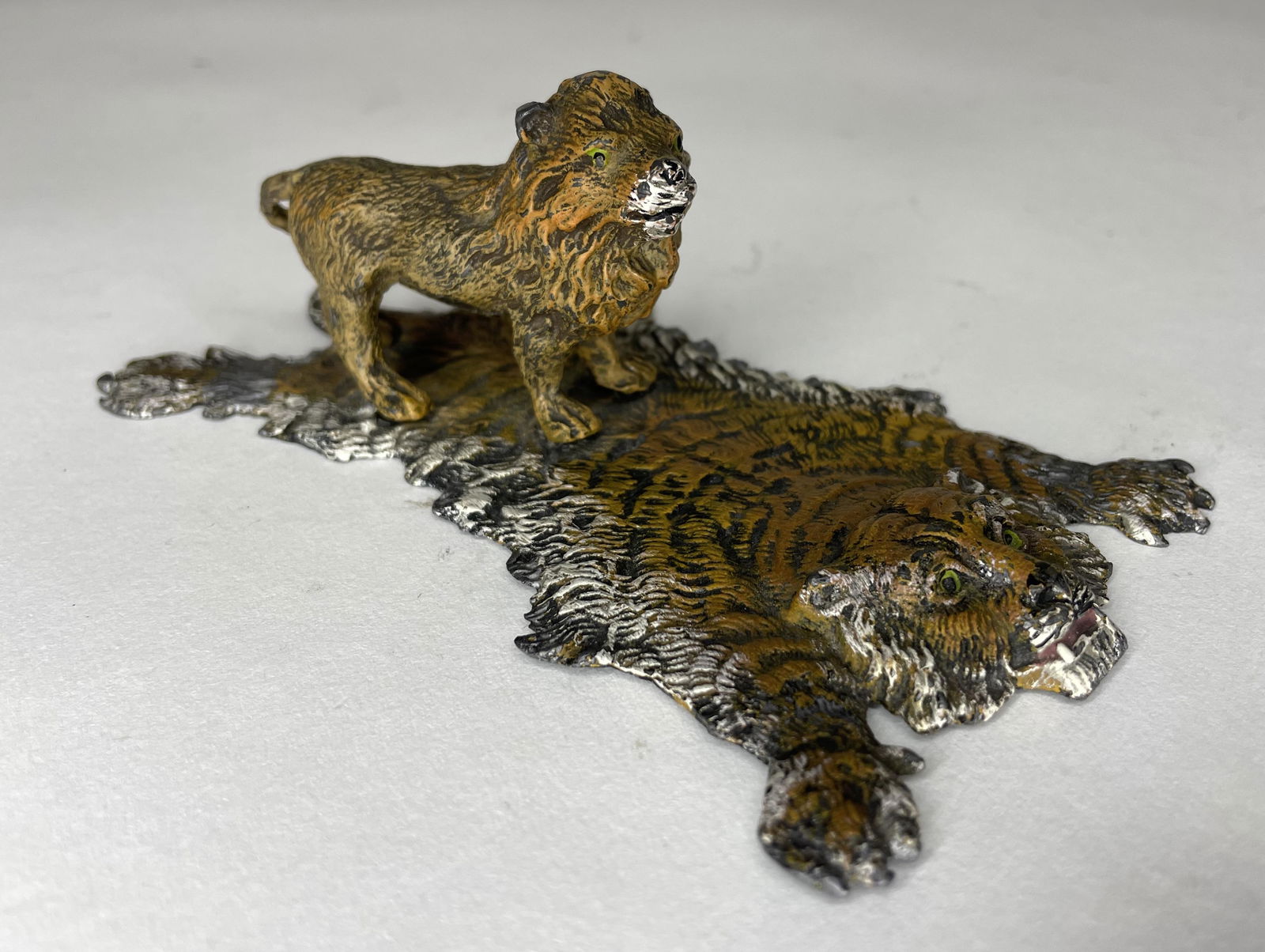 Heyde King of the Beasts Lion Atop Tiger Skin: 1 Piece. 5 inches long. Condition Excellent.