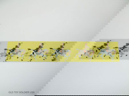 Britains FROM Set 101 Life Guards Band: Pre War Blue and Gold Uniforms Clarinet, Tuba, Trombone, Cornet and Bassoon (Damaged). Unboxed. Non matching paint on horses.