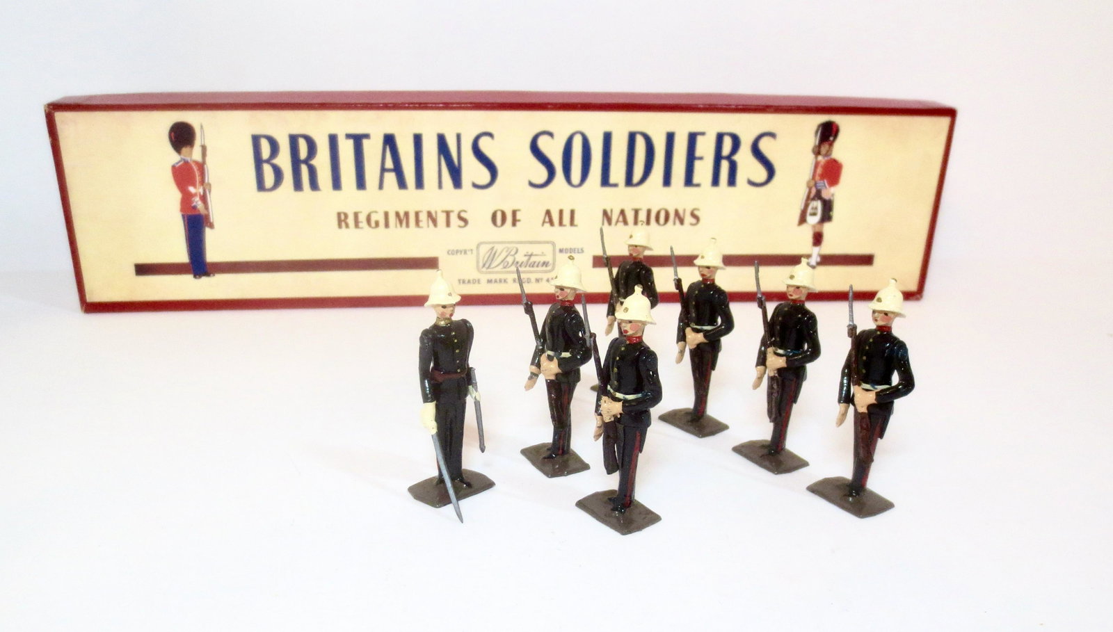 Britains #2071 Royal Marines: Present Arms. Post war issue. 7 pieces. Near mint condition. ROAN label box excellent.