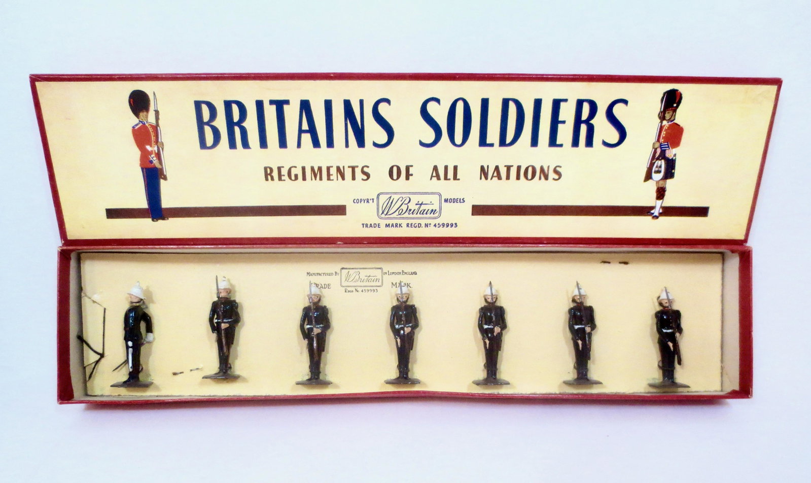 Britains #2071 Royal Marines: Present Arms. Post war issue. 7 pieces. Near mint condition, retied to card in box. ROAN label box excellent.